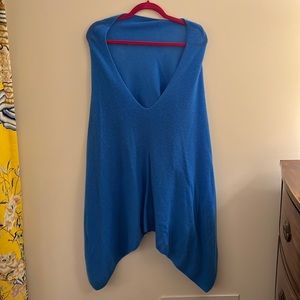 This is a sky blue cashmere poncho